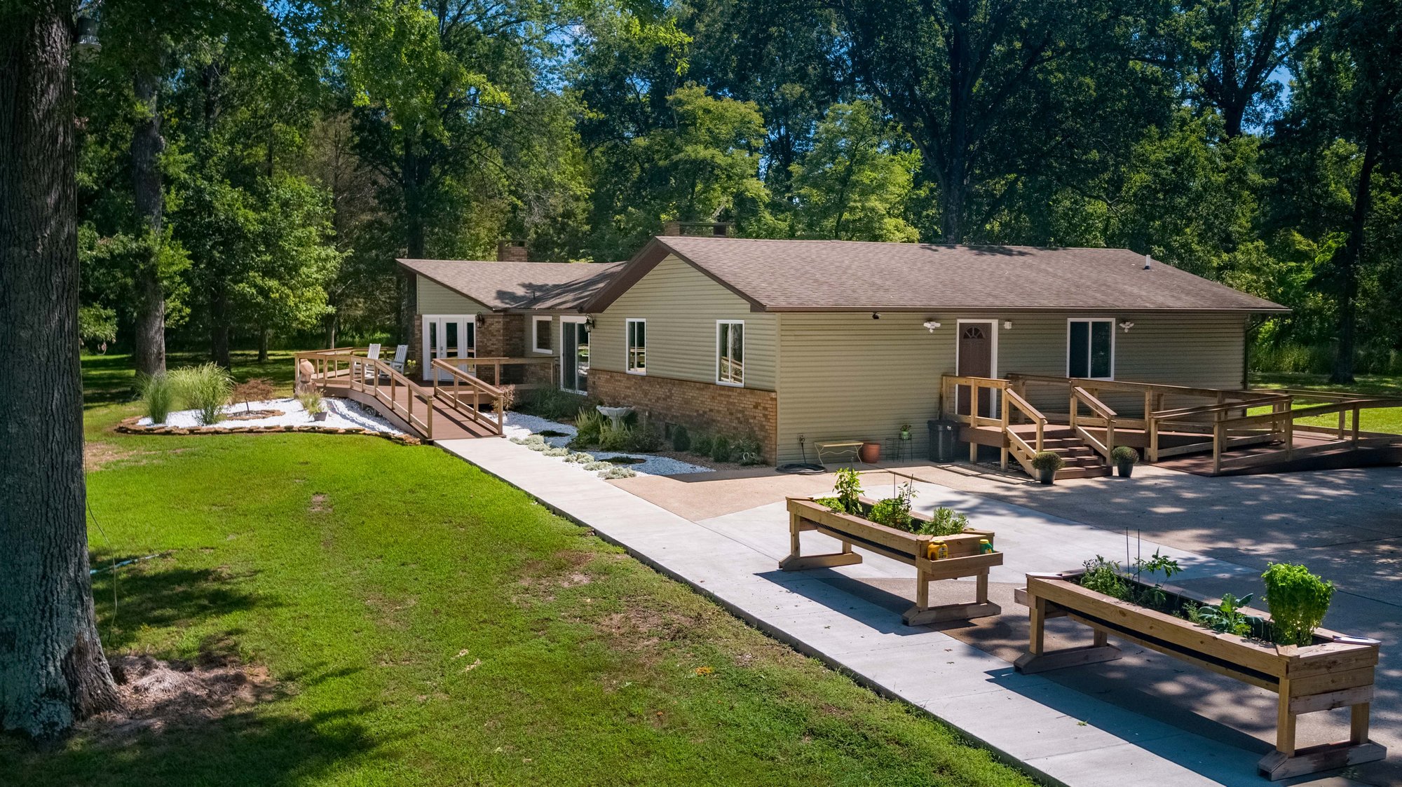 Outdoor shot of home with raised planter boxes